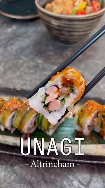 A montage showcasing dishes like hoisin duck uramaki, salt and pepper chicken wings, and chicken katsu curry at Unagi in Altrincham, alongside shots of the restaurant's interior.
