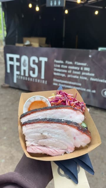 A montage showcasing a variety of street food vendors at an outdoor festival event in the woods, highlighting different cuisines and the family-friendly atmosphere.