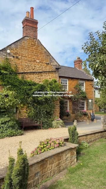 A montage video showcasing the exterior, beer garden, and interior of the Old White Hart pub in Lyddington, Rutland. The video features shots of the building, the outdoor seating area, and glasses of beer, set to music with text overlays.
