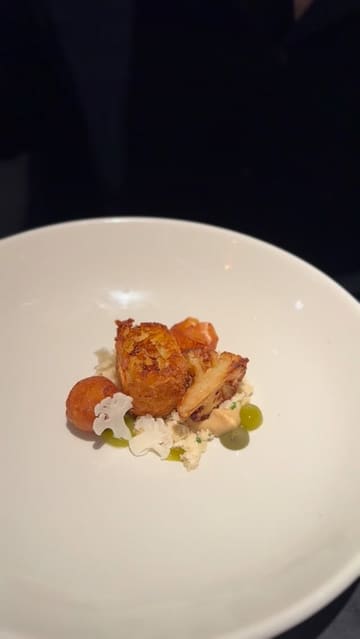 A montage showcasing the 6-course tasting menu experience at Six by Nico, featuring shots of the restaurant exterior, interior, and various plated dishes.