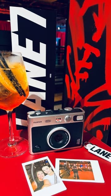A short, upbeat reel showcasing a visit to Lane 7 in Cardiff, highlighting the various entertainment options like bowling, darts, and arcade games, alongside food and drinks.