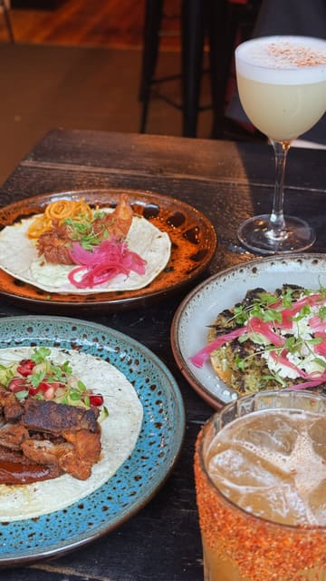 A short, fast-paced montage showcasing a variety of Mexican dishes including tacos, tostadas, and cocktails at a restaurant in Glasgow City Centre.