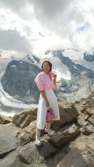 A travel vlog showcasing a scenic journey through the Swiss Alps, including the Glacier Express train and stays at luxury hotels in St. Moritz and Zermatt.