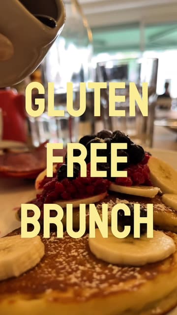 A short, engaging reel showcasing a cafe in Surbiton that offers gluten-free brunch options, including pancakes and cakes.
