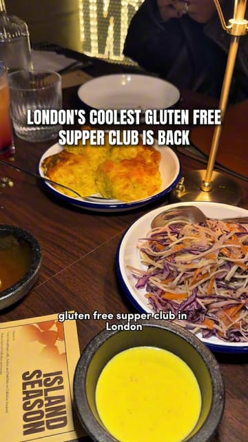 A review of a gluten-free Caribbean-themed supper club hosted by La Maison Des Moments in London. The video features shots of the venue, the food (jerk chicken, curry goat, mac and cheese pie), and a rum punch masterclass, with the creator providing commentary on the experience.