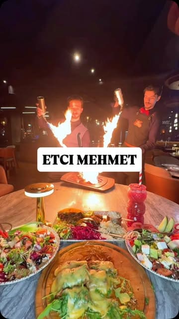 A fast-paced, visually engaging promotional video for Etci Mehmet, featuring a variety of Turkish-inspired dishes and cocktails. The video highlights the dramatic tableside service, including fire shows and cheese pulls, to create an exciting dining atmosphere.