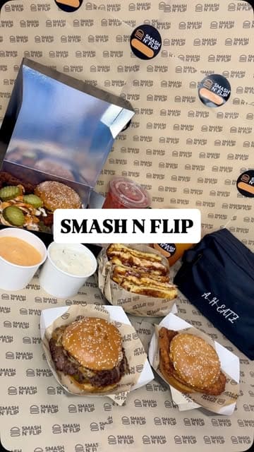 A fast-paced food showcase video featuring a variety of burgers, chicken sandwiches, loaded fries, milkshakes, and desserts from Smash N Flip.