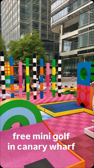 A short, energetic vlog showcasing a free, pop-up mini-golf course in Canary Wharf, highlighting the accessibility and fun nature of the activity.