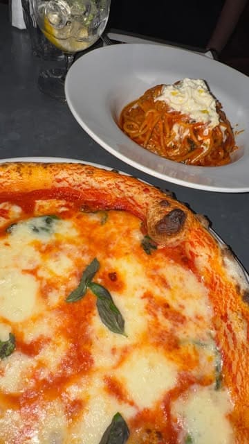A short video showcasing a lunch visit to Bosco Pizzeria in Cardiff, featuring the exterior, menu, interior, and a selection of Italian dishes including arancini, zucchini fritti, pizza, spaghetti, and desserts.