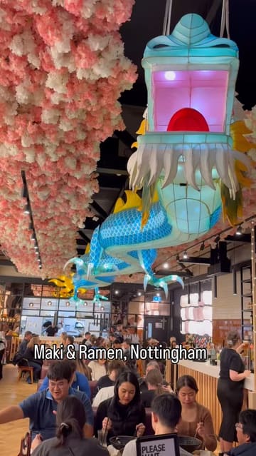 A short, vlog-style review of Maki & Ramen in Nottingham, featuring shots of the restaurant's distinctive dragon decor, the menu, and a variety of Japanese dishes including ramen, sushi, and sashimi.
