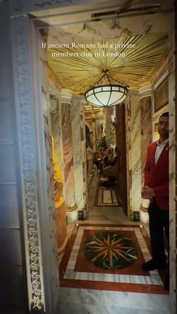 A cinematic tour of an opulent, Roman-themed cocktail bar in London, highlighting the marble decor, classical statues, and signature cocktails.