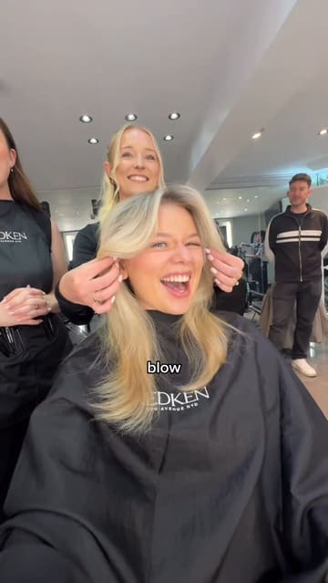A day-in-the-life vlog featuring a visit to a cafe for a pastry and coffee, followed by a hair appointment at a Redken event, and returning to the cafe to work.
