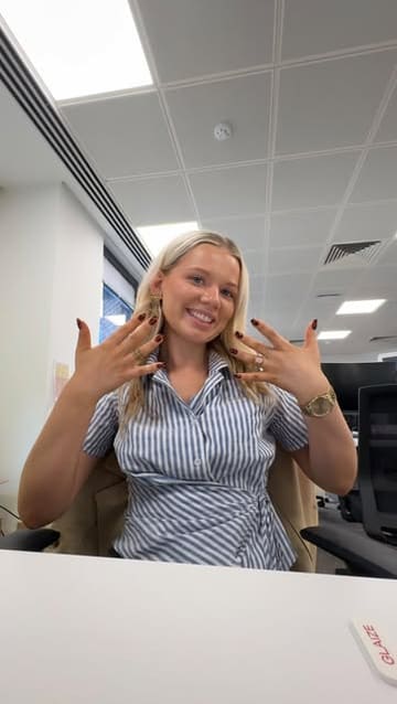 A corporate worker documents her after-work experience attending a Real Housewives of London premiere event at the Ham Yard Hotel, featuring a brand collaboration with Glaize nails. The video captures the transition from office to event, showcasing the hotel's bar and cinema room.