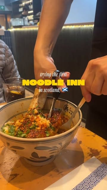 A short, energetic video showcasing a visit to the newly opened Noodle Inn in Glasgow. The reel features close-ups of their signature knife-cut noodles, braised beef ribs, and Chinese-style burgers, alongside a glimpse of the fresh noodle-making process in the open kitchen.