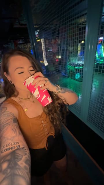 A vlog-style tour of ML7, a self-serve arcade bar in Newcastle, showcasing the self-pour beer wall and various arcade games like basketball, axe throwing, and air hockey.