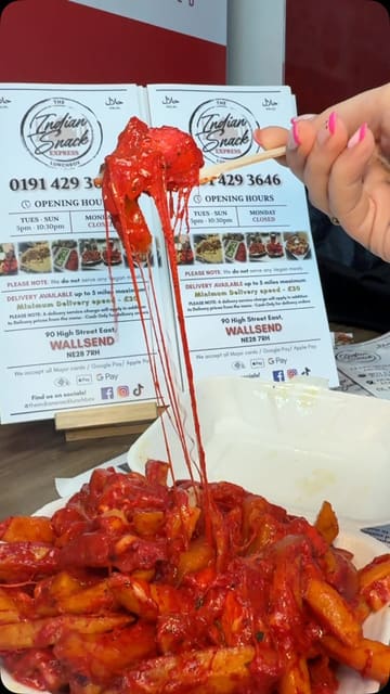A creator reviews a takeaway venue called The Indian Snack Lunchbox, showcasing their loaded chicken tikka cheese fries, a chicken tikka kebab box, and a chicken tikka and donner pizza.