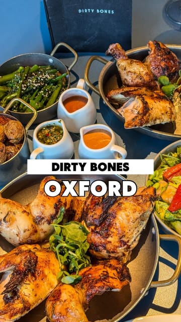 A high-quality, polished montage showcasing a new spit roast chicken menu at Dirty Bones. The video features close-up shots of the chicken, sides, cocktails, and desserts, accompanied by text overlays detailing the menu and pricing.