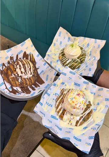 A fast-paced, high-energy food reel showcasing a variety of dishes from Chicos, including brisket smash burgers, loaded fries, mozzarella sticks, and a new dessert menu featuring cookies and tiramisu. The video uses quick cuts and close-up shots to emphasize the texture and appeal of the food.