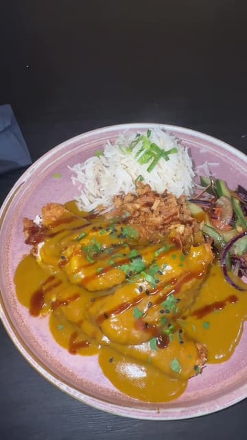 A couple visits The Tipsy Cow in Airdrie, showcasing their drinks, starters, and main courses, while providing a positive review of the food quality and value.