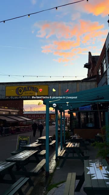 A promotional video for Picante, a pop-up Mexican cantina in Liverpool. The video features a montage of the venue's exterior and interior, close-ups of tacos and nachos, and shots of cocktails being prepared by a bartender.