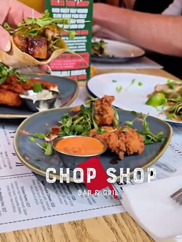 A group of friends visits Chop Shop in Kelham Island to try their new menu, featuring a variety of steaks, burgers, tacos, and desserts, along with cocktails and beer.