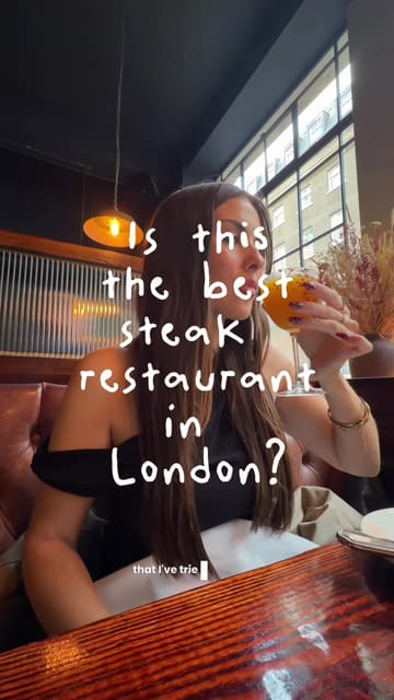 A review of Goodman steakhouse in London, showcasing cocktails, starters, a porterhouse steak, sides, and desserts.