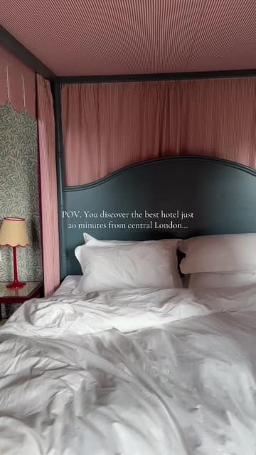 A short, aesthetic montage showcasing the interiors of The Mitre Hotel, including the bedroom, bathroom, and river views, alongside shots of drinks and food.
