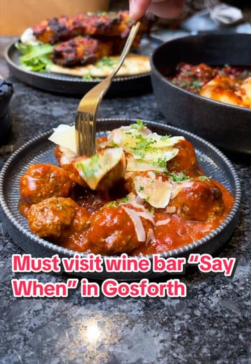 A visually enticing promotional video for 'Say When' wine bar, highlighting their self-serve wine machines and a variety of high-quality tapas-style dishes. The video uses quick, rhythmic cuts to showcase the food and drink, creating a sophisticated and inviting atmosphere.