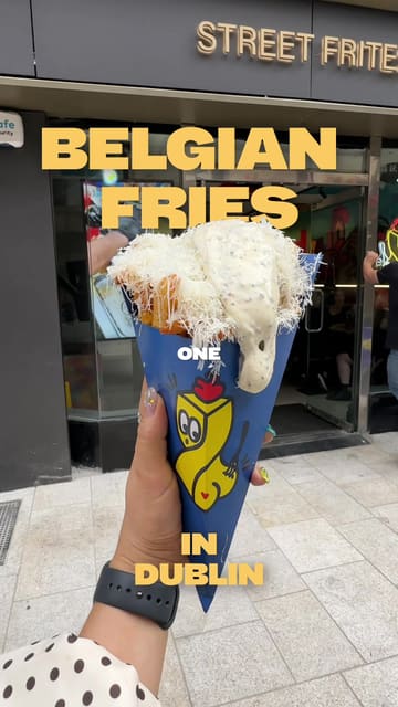 A short, engaging vlog-style video showcasing a visit to Street Frites in Dublin, highlighting their loaded Belgian fries and the preparation process.