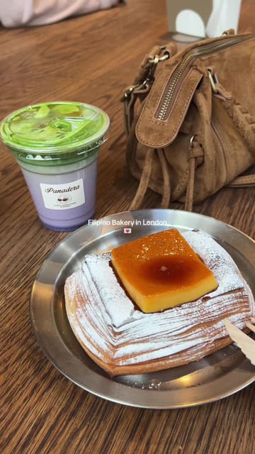 A short, music-led montage showcasing the pastry display and menu at Panadera, a Filipino bakery in London. The video features close-ups of various baked goods like danishes, croissants, and doughnuts, as well as an ube matcha latte.