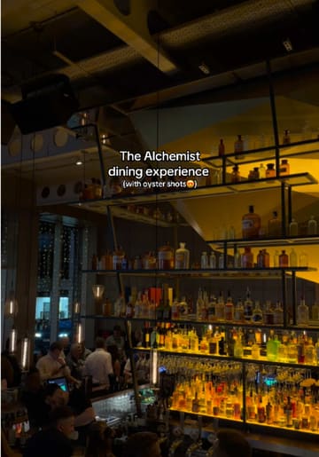 A montage showcasing the cocktail and dining experience at The Alchemist, featuring their signature theatrical cocktail presentation, oyster shots, and various food dishes.