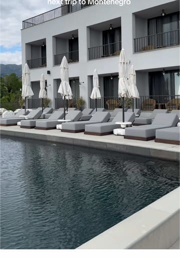 A short, aesthetic tour of the Vivid Blue Serenity Resort in Montenegro, showcasing the pool area, lounge, and hotel room.