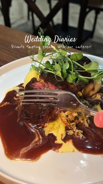 A couple documents their private wedding food tasting experience at a cafe, showcasing a variety of starters, mains, and desserts provided by their caterer.