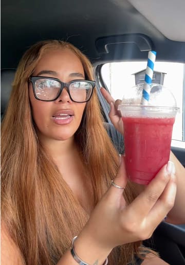 A creator visits Raheem's Juices in Bristol, showcasing the menu and reviewing a fresh fruit juice.