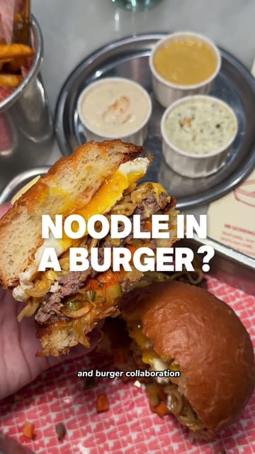 A review of a limited-edition Mi Goreng burger collaboration at Zula, featuring close-ups of the burger, kitchen preparation, and the creator's taste test.