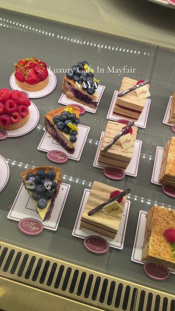 A short, aesthetic montage showcasing the interior, exterior, and pastry selection of Naya, a luxury cafe in Mayfair.