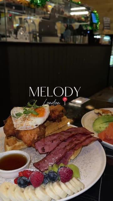A short, aesthetic montage showcasing the interior, menu, and brunch dishes at Melody Bistro & Brunch in London. The video features quick cuts of coffee, matcha, and plated brunch items like waffles and avocado toast.