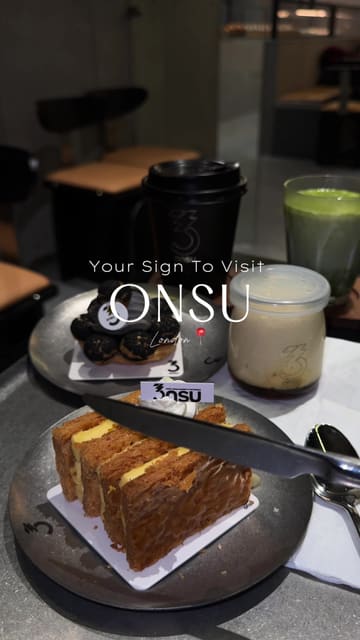 A fast-paced, music-driven promotional video for Onsu, an Asian-inspired bakery and patisserie in Soho, London. The video features a montage of the storefront, the display case filled with various breads, pastries, and desserts, and close-up shots of the food, including a Wagyu beef curry bun being pulled apart.