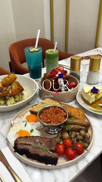 A short, aesthetic montage showcasing the brunch menu and drink preparation at Nour Cafe in Walthamstow, featuring a variety of dishes like french toast, brisket, and matcha lattes.