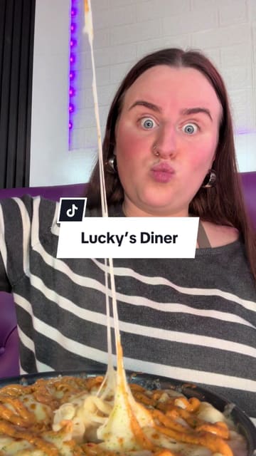A review of Lucky's Diner in Glasgow, showcasing their menu, mocktails, mozzarella sticks, veggie burger, mac and cheese, and desserts.
