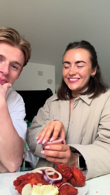 A couple documents their trip to pick up a takeaway from Clay Oven, showing the drive, the exterior, the interior, and the final meal at home. The video serves as a personal recommendation for the quality and portion sizes of the food.