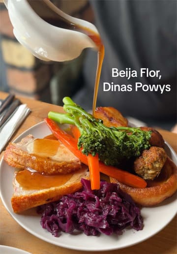 A review of the Sunday roast at Beija Flor, featuring close-ups of the roast beef, pork loin, and a vegetarian mushroom and spinach tart, alongside cocktails and the venue's interior.