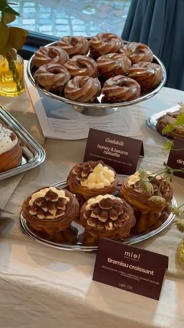A polished montage showcasing a variety of artisanal pastries, desserts, and coffee drinks available at a coffee event at Café Ciel.