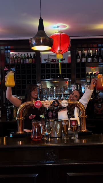 A high-energy, fast-paced promotional video featuring two creators dancing and lip-syncing to showcase the lively atmosphere of a bottomless brunch event. The video transitions from the street to the venue interior, highlighting the social and party-focused nature of the experience rather than specific menu items.