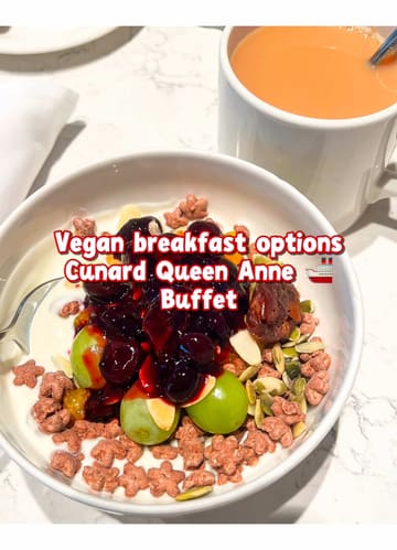 A video showcasing the vegan breakfast buffet options available on the Cunard Queen Anne cruise ship, highlighting specific items like bread, fruit, cereals, and custom porridge.