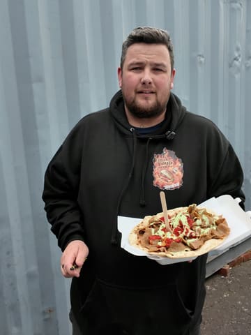 A food reviewer visits a takeaway shop in Derby to review their kebab, following a recommendation from another reviewer.