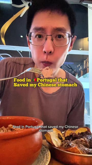 The creator reviews several dishes at a restaurant in Portugal, including pork cheeks, octopus rice, Iberian pork, shellfish xarem, and a croissant misto prensado. The video follows a consistent format of showing the dish followed by the creator's reaction.
