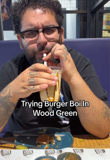 A food review vlog featuring a visit to Burger Boi in Wood Green, where the creator samples various items including smash burgers, chicken tenders, and a milkshake.