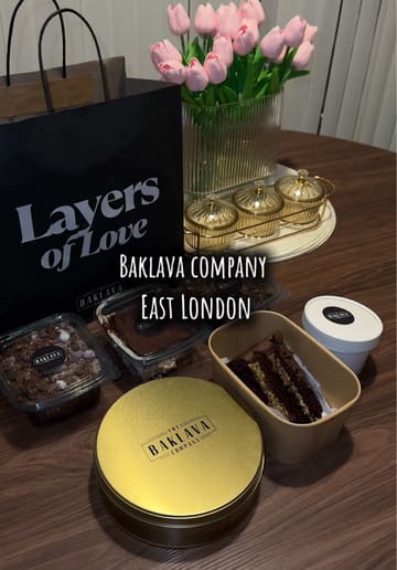 A promotional video for 'Layers of Love' in East London, showcasing their range of desserts including baklava, mini egg crunch cake, and tiramisu. The video features shots of the shop's interior and close-ups of the desserts being served.