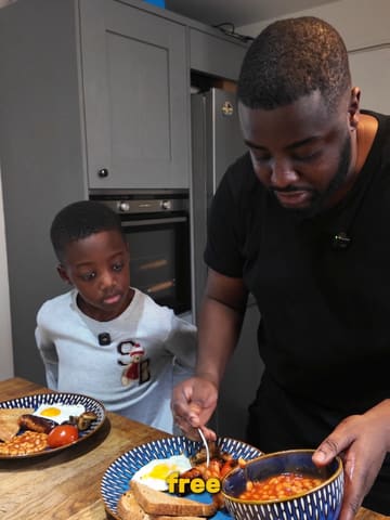 A father and son cook a fry-up breakfast at home while discussing an energy company's Sunday Saver offer.